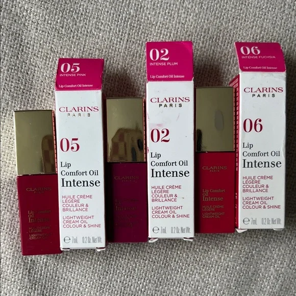 Set of 3 NWT Clarins Lip Comfort Oil Intense - Pink, Plum, Fuchsia available - Picture 2 of 3